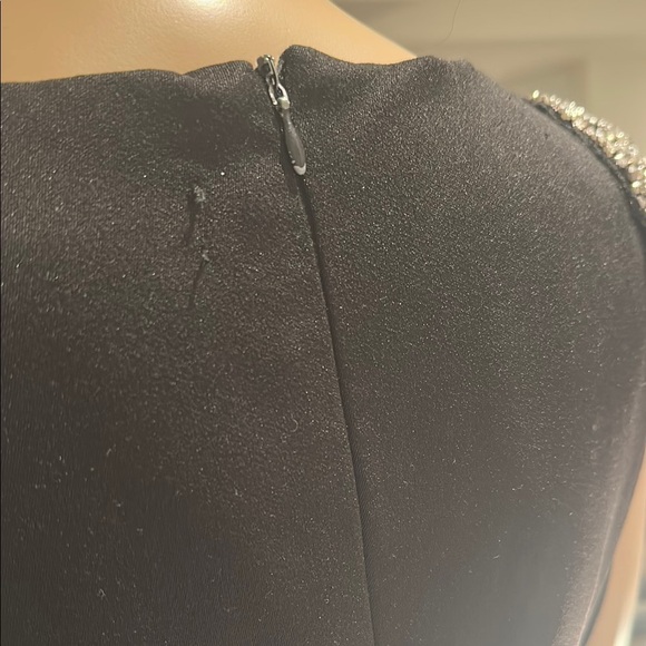 Black Sleeveless Peplum Blouse with Embellished Shoulders - Picture 7 of 7